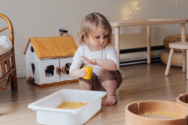 girl-holding-yellow-plastic-cup-full-of-macaroni-3933271.jpg