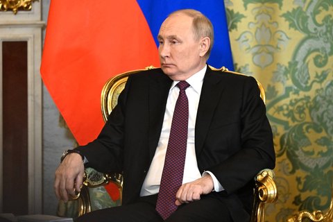 Путин