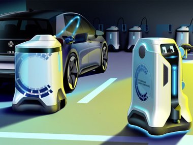 slide image for gallery: 27222 | Volkswagen научил робота заряжать электромобили