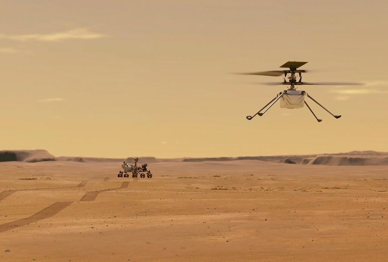 Иллюстрация первого полета на Марсе, качественные фотографии с мини-вертолета появятся через несколько часов.