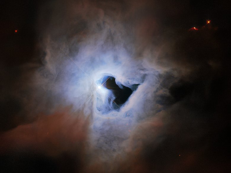На фото показана туманность NGC 1999. Наиболее заметным аспектом внешнего вида NGC 1999 признают «отверстие» в центре, которое напоминает замочную скважину космических размеров. Источник: ESA/Hubble & NASA, ESO, K. Noll