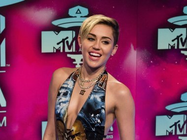 Майли Сайрус на премии MTV Europe Music Awards в Амстердаме, 2013 год Майли Сайрус на премии MTV Europe Music Awards в Амстердаме, 2013 год