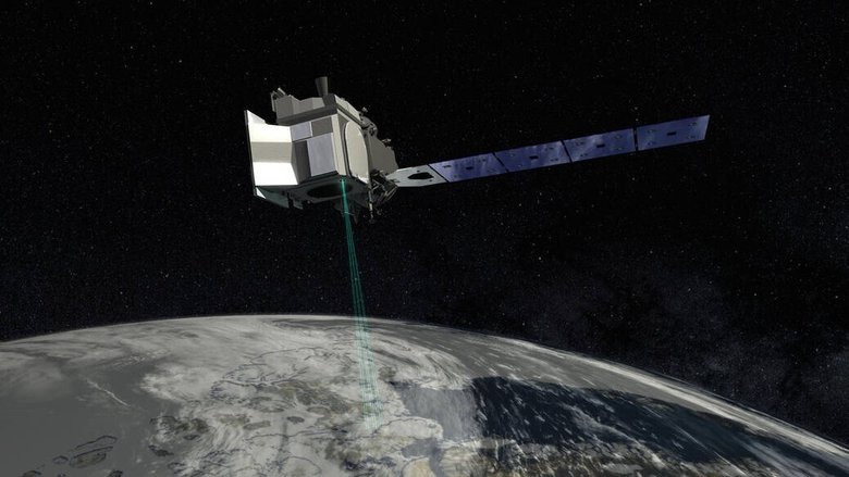 Художественная иллюстрация спутника ICESat-2, направляющего лазеры к поверхности Земли. Фото: NASA