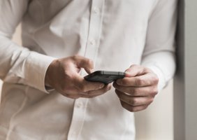 смартфон в руках