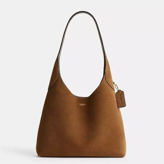 Сумка Brooklyn bag от Coach, которая названа одной из самых модных сумок 2024-го по рейтингу Lyst Сумка Brooklyn bag от Coach, которая названа одной из самых модных сумок 2024-го по рейтингу Lyst