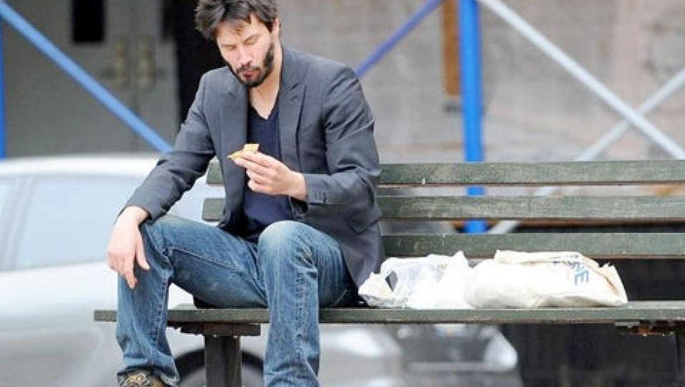 Keanu Reeves Sitting Alone