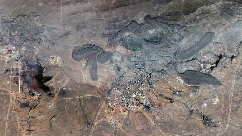 Вид с воздуха на месторождение Баян-Обо, где обнаружили новый тип руды. Источник: space.com