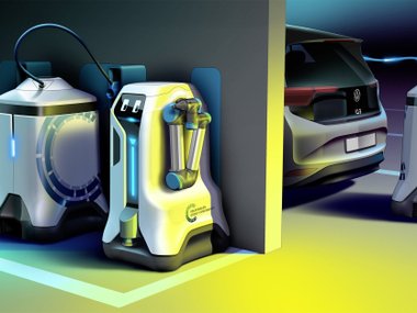 slide image for gallery: 27222 | Volkswagen научил робота заряжать электромобили