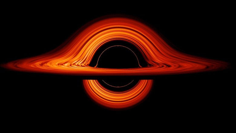 Визуализация черной дыры, границу которой заметил «Горизонт событий». На ней можно увидеть турбулентный газовый диск, клубящийся вокруг космического объекта. Фото: NASA