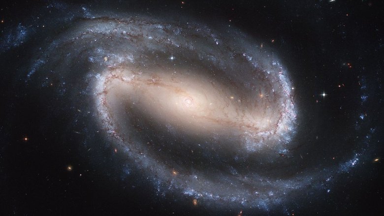 NGC 1300 — спиральная галактика с перемычкой и двумя рукавами, сфотографированная космическим телескопом «Хаббл». Так может выглядеть и наш Млечный Путь