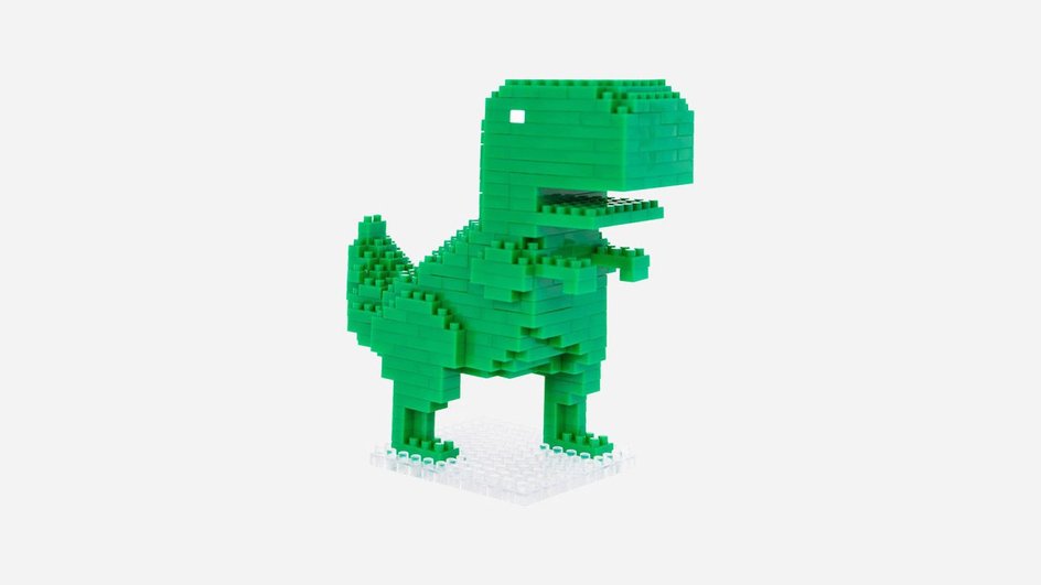 В оригинале динозаврик был серым, но Google решила разукрасить его в фирменный цвет Android. Источник: shop.merch.google