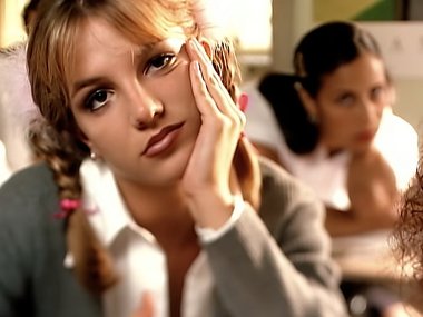 Slide image for gallery: 15671 | Кадр из клипа Бритни Спирс на песню "…Baby One More Time",  1998 г. |