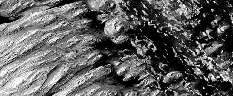 Часть формирования Медуза-Фосса на Марсе, демонстрирующая эффект миллиардов эрозий. Изображение было получено камерой высокого разрешения Imaging Science Experiment (HiRISE) на борту орбитального аппарата Mars Reconnaissance Orbiter. Фото: НАСА / JPL / Университет Аризоны