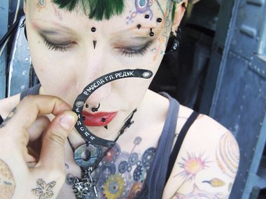 Slide image for gallery: 10031 | Как выглядит девушка с татуировками на лице