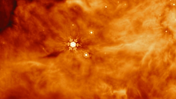 Параллельное поле протозвезды IRAS 23385 (изображение MIRI)
