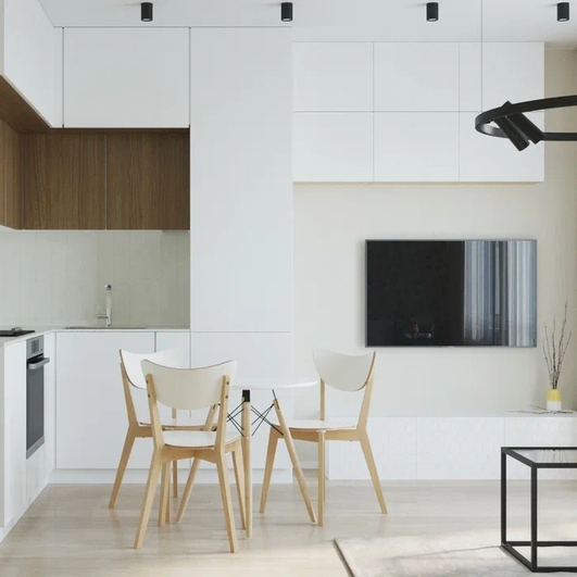 Белая кухня в стиле минимализма со столом, стульями и гарнитуром