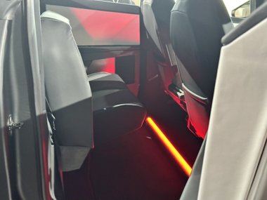 tesla-investor-day-the-cybertruck-shows-a-squarish-steering-wheel-drop-front-center-seat_2.jpeg