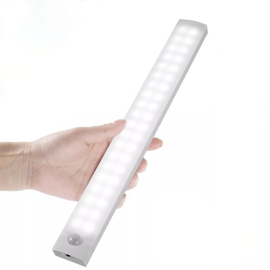 Беспроводной универсальный светильник Данный светильник представляет собой длинный прямоугольник, оснащенный 21 яркими диодами. Устройство можно повесить и приклеить на двухсторонний скотч куда угодно: на кухонный гарнитур, в спальню, в шкаф, в туалет или