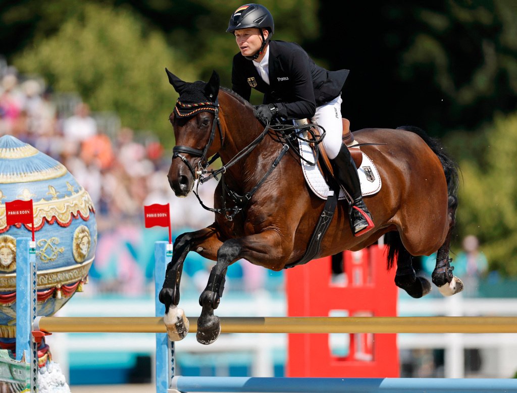 Немецкий конник, выиграв золото, вошел в историю Олимпийских игр