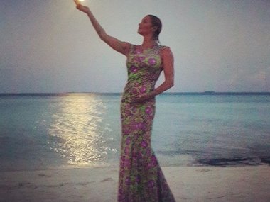 Slide image for gallery: 5125 | «Мальдивская луна на ладони», — прокомментировала снимок балерина