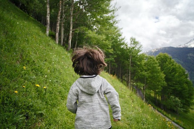 toddler-wearing-gray-hoodie-running-on-green-fields-2495567_1.jpg