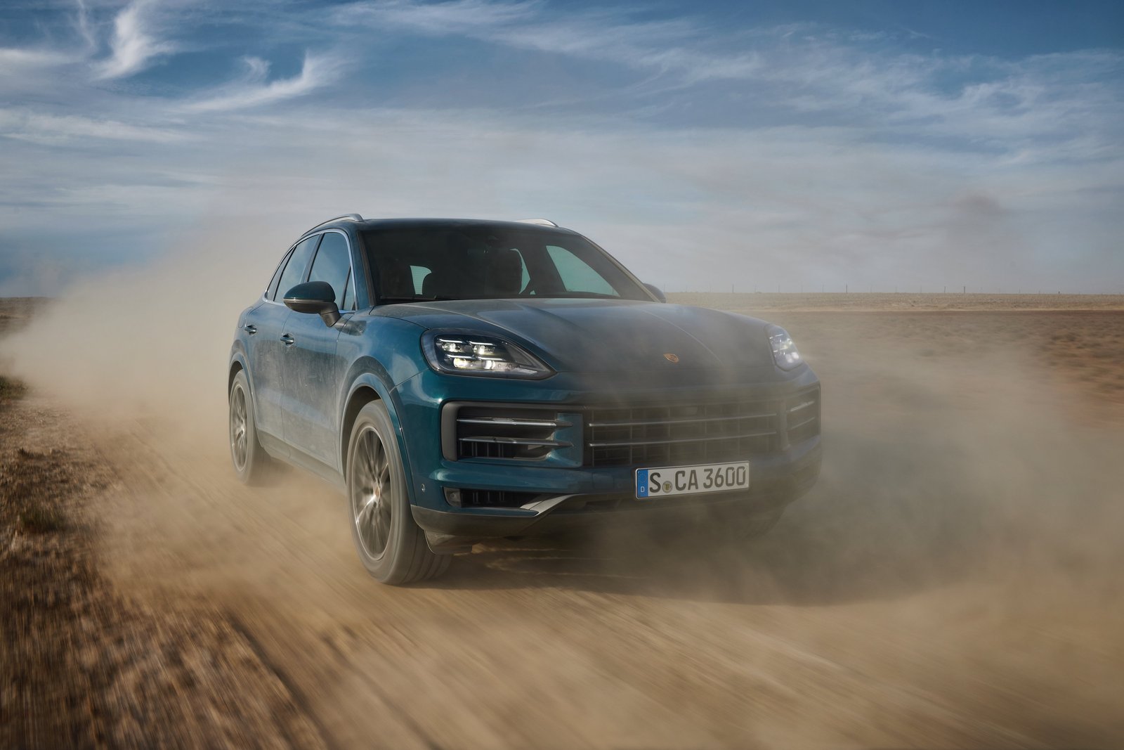 За рулем Porsche Cayenne 2020