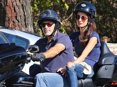 Slide image for gallery: 9391 | Джордж Клуни на мотоцикле с женой Амаль