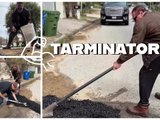 Арнольд Шварценеггер ремонтирует дорожную яму