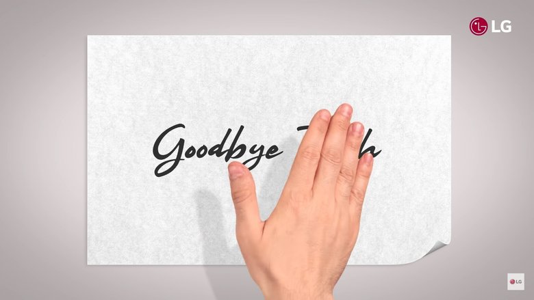 В ролике рука проводит по бумаге и за ней появляется надпись «Прощай, тач»