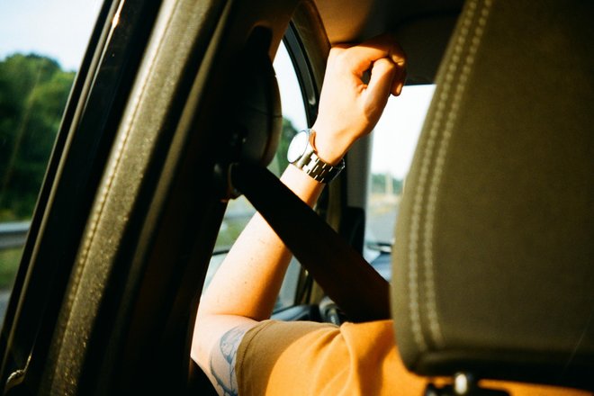 person sitting inside car during day