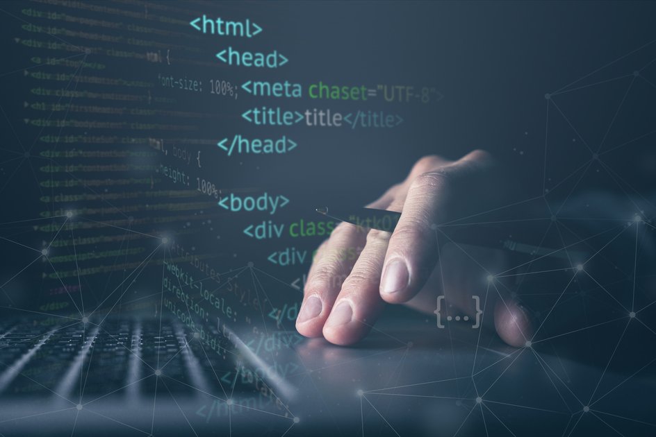 HTML код, ноутбук и рука человека HTML код, ноутбук и рука человека