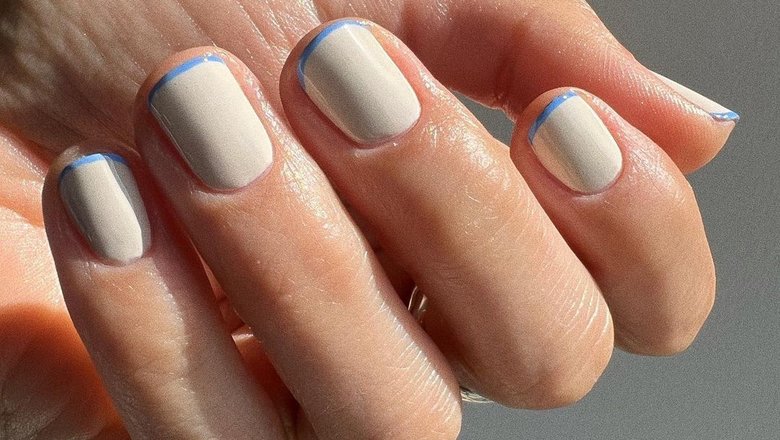 Белые ногти с синим френчем. Фото из аккаунта мастера Бетины Гольдштейн