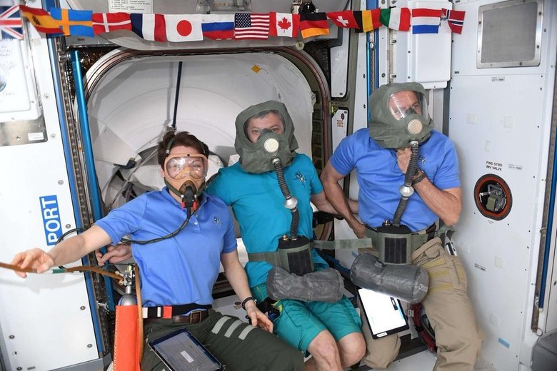 Экипаж МКС на борту космического корабля Crew Dragon. 4 марта 2019 года. Фото: Global Look Press/Roscosmos
