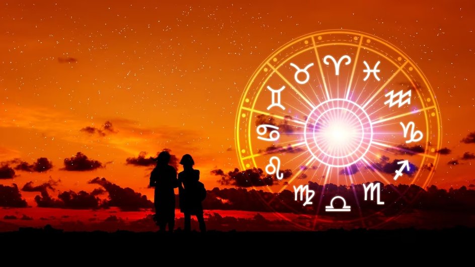На фоне заката - два силуэта - мужской и женский, на небе - круг со знаками зодиака.