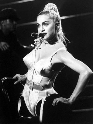 Slide image for gallery: 1052 | Мадонна была одной из первых, кто ввел в моду бюстгальтеры в качестве верхней одежды. Конусные лифчики и корсеты, которые Жан-Поль Готье сделал специально для ее тура 1990 года, произвели настоящий фурор