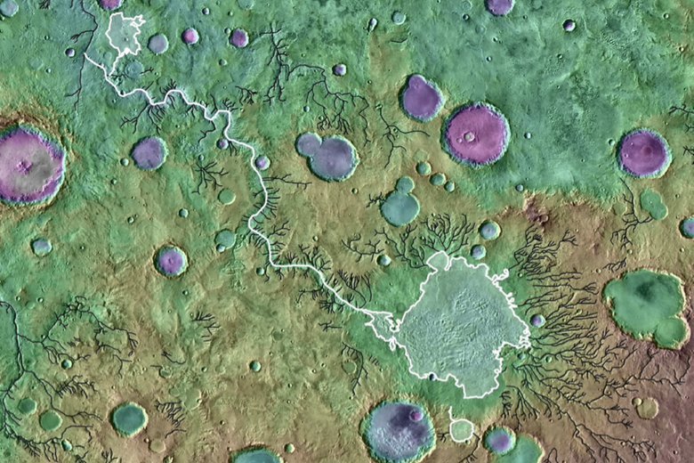 Кратеры и речные долины на поверхности Марса. Белым очерчены прорванное кратерное озеро и выходная долина. Фото: NASA/GSFC/ JPL ASU