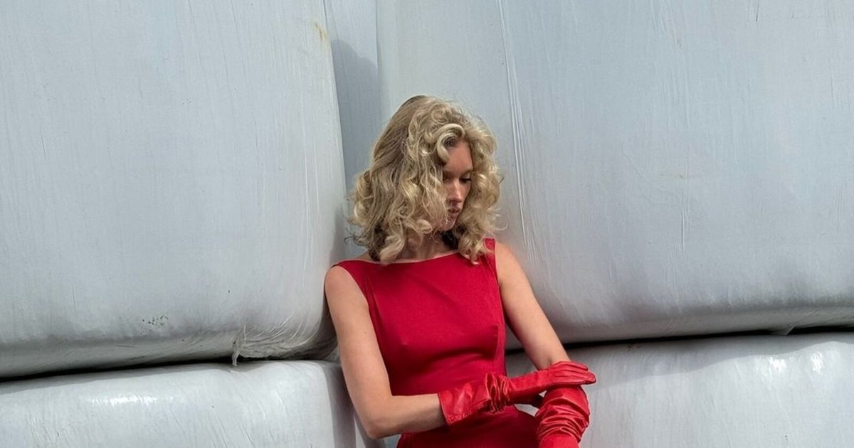 Elsa Hosk in a scarlet midi dress by Helsa