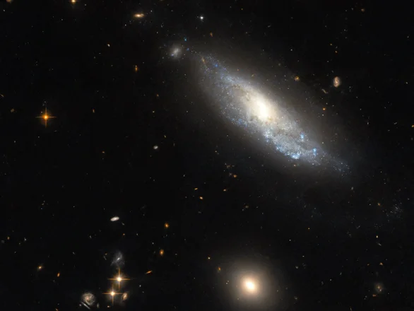 Спиральная галактика NGC 298, в которой в 1986 году произошел взрыв сверхновой типа II — один из самых мощных в космосе. Фото: NASA